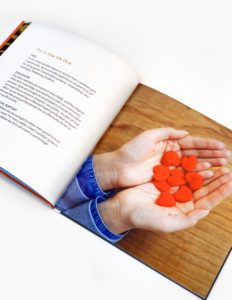 Aprio Giving Back Booklet Interior Spread - Hand Hearts